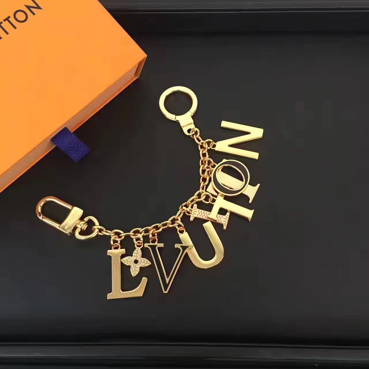 l0vis Vvtt0n key chain cohotbag