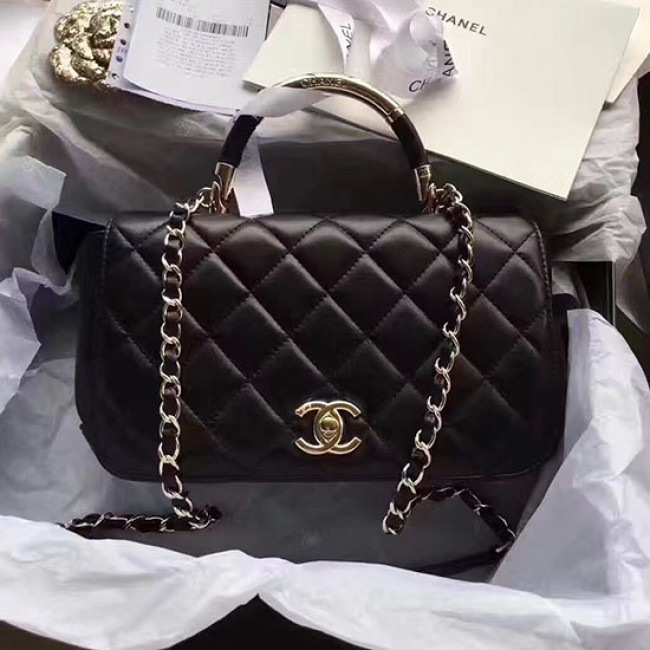 Ch**el caviar quilted lambskin flap bag with top handle black