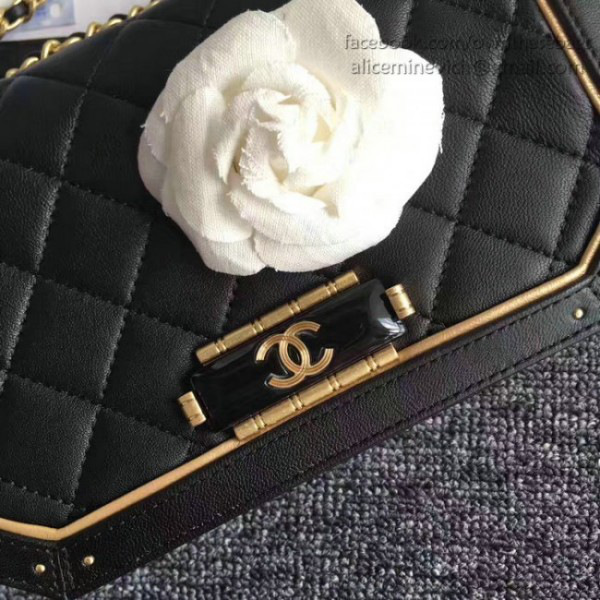 Ch**el lambskin and calfskin flap bag black