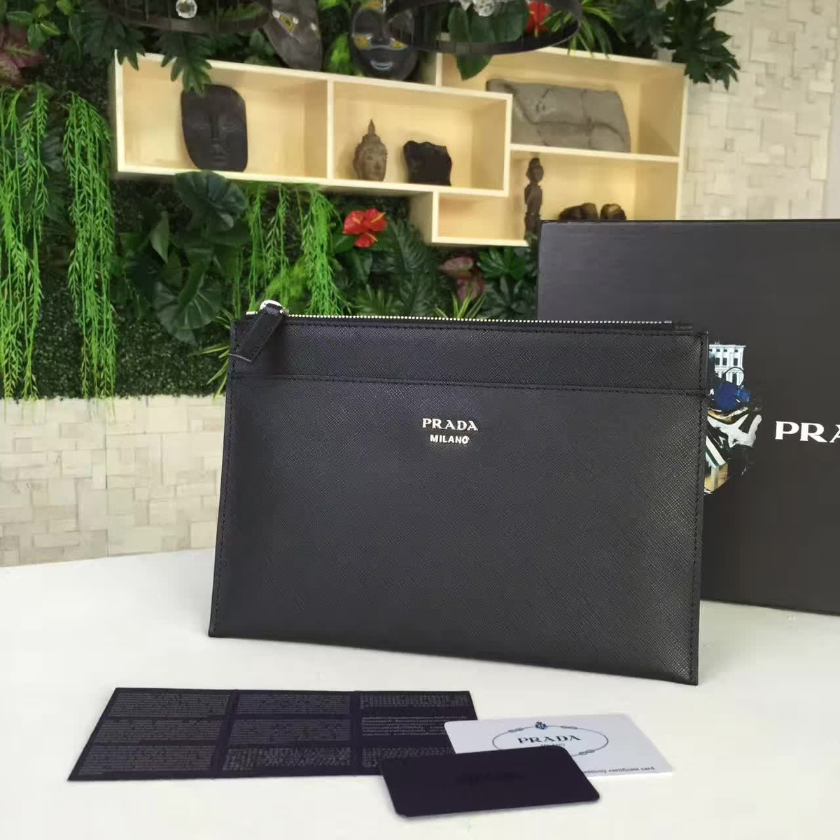 Pra*a leather clutch bag 4261