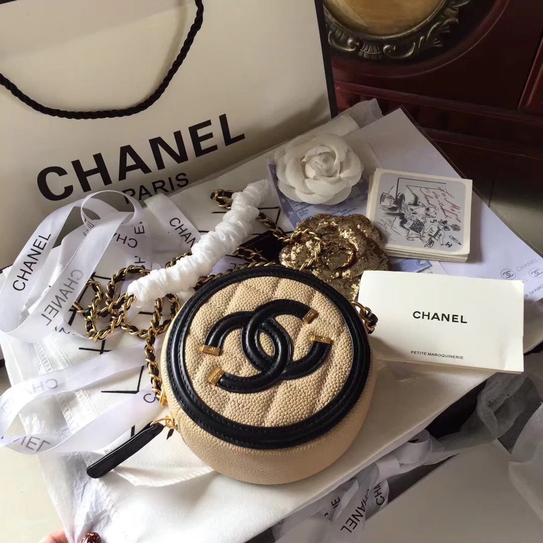 Ch**el cc filigree grained round clutch with chain bag beige