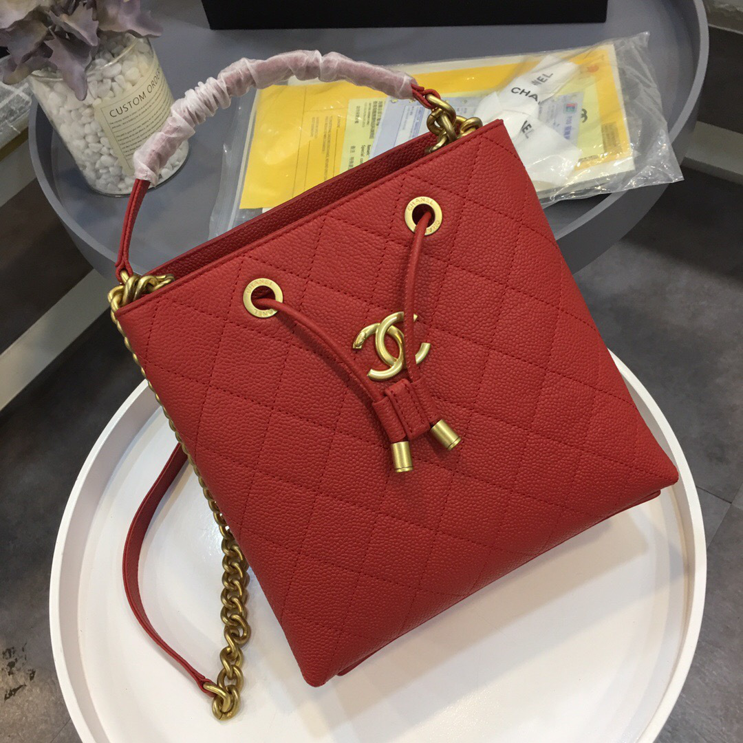 Ch**el's latest drawstring bucket bag big red