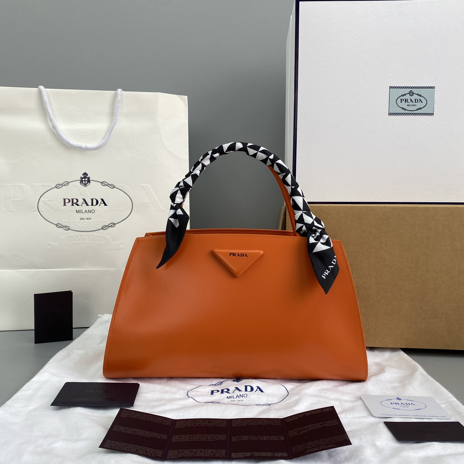 Pra*a miuccia x raf simons orange 33 x 18 x 13.5 cm