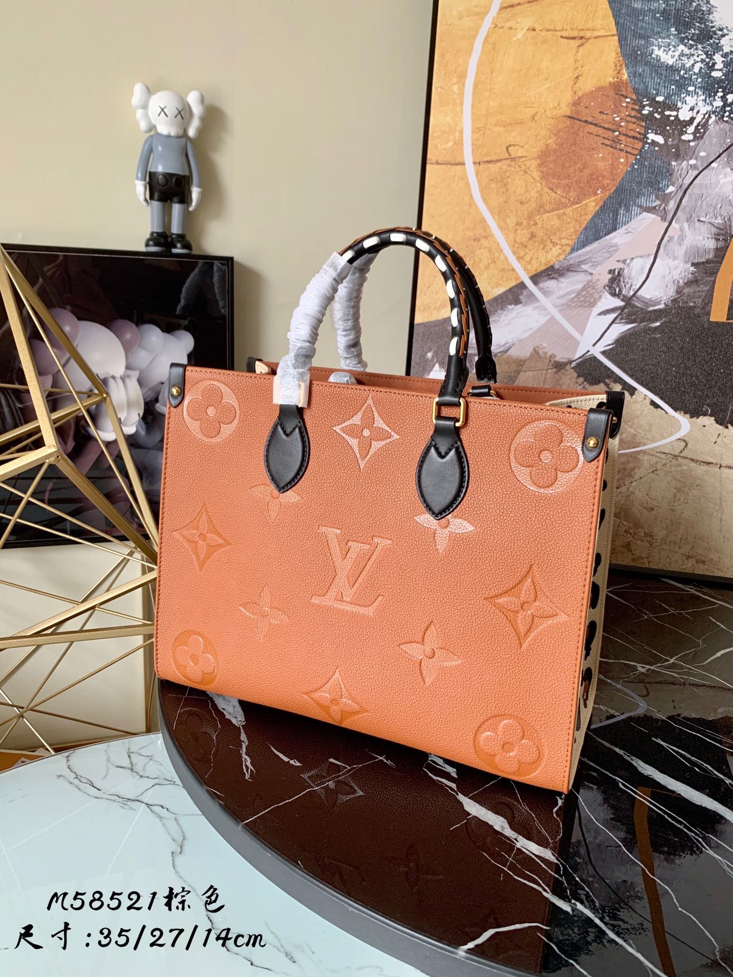 l0vis Vvtt0n onthego mm monogram empreinte embossed leather caramel m58521 35cm