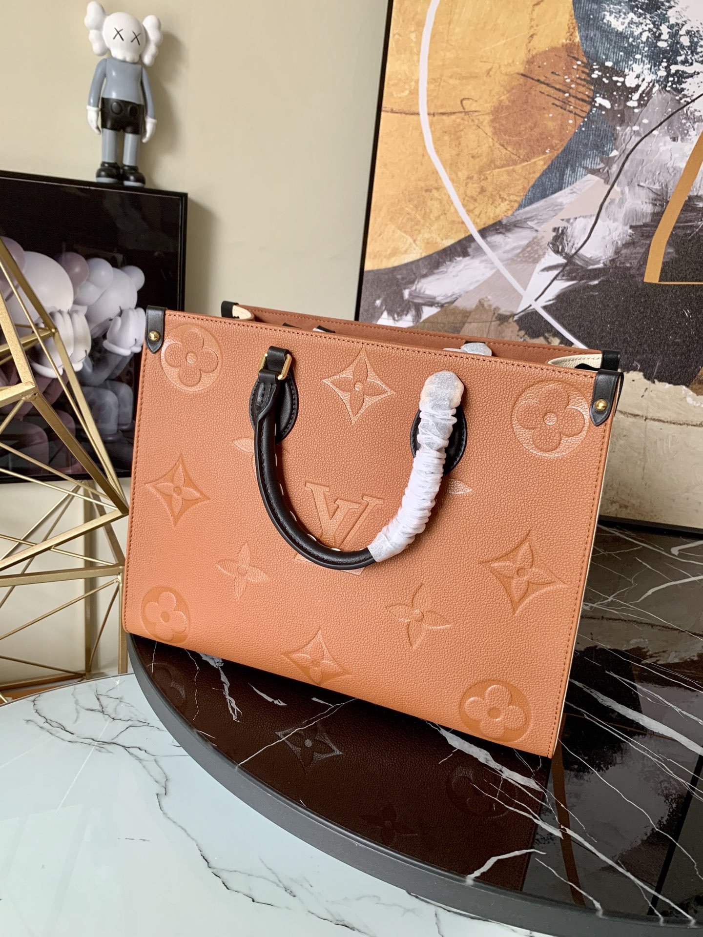 l0vis Vvtt0n onthego mm monogram empreinte embossed leather caramel m58521 35cm