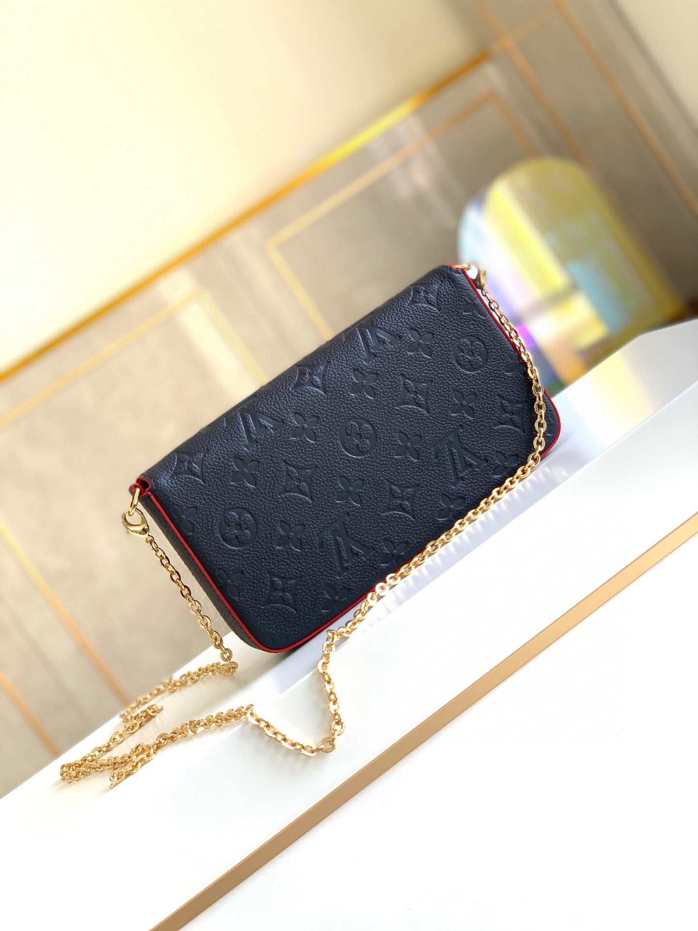 l0vis Vvtt0n fÉlicie pochette monogram empreinte leather navy and red m64099 21 x 12 x 3 cm
