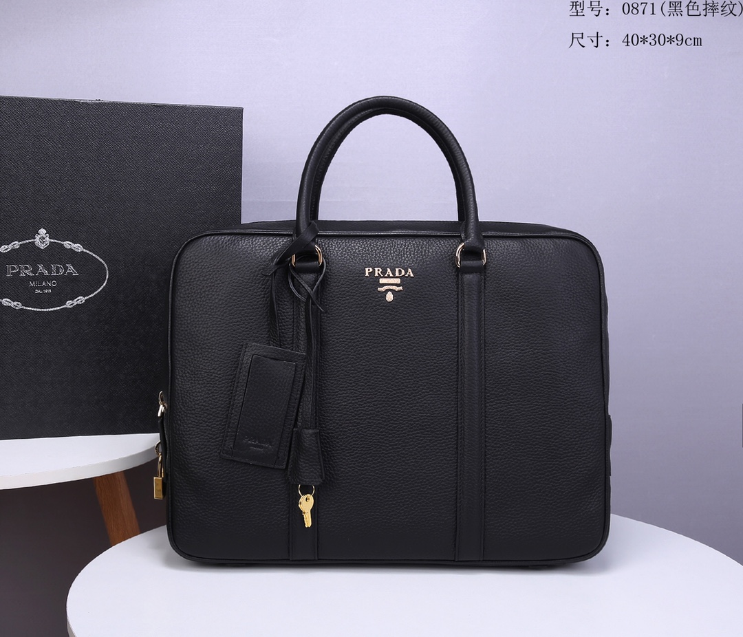 Pra*a briefcase grained cowhide leather golden metal black 8017 40 x 30 x 9 cm