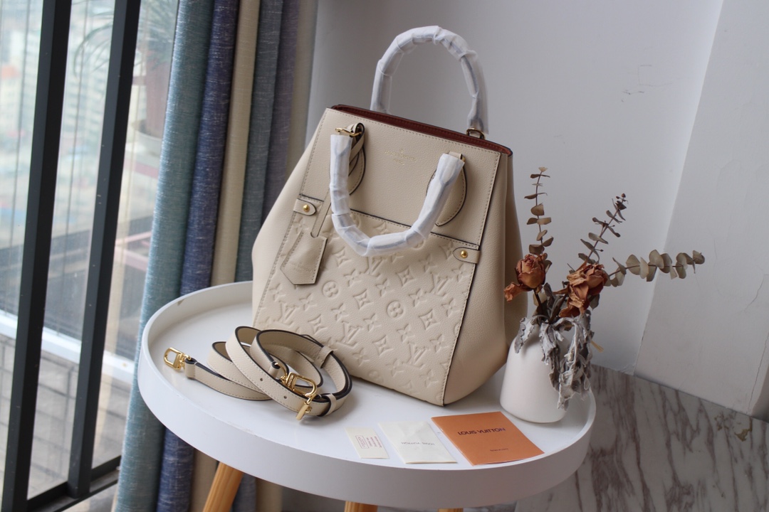 l0vis Vvtt0n fold tote mm monogram empreinte leather creme m45409 23 x 28 x 19 cm
