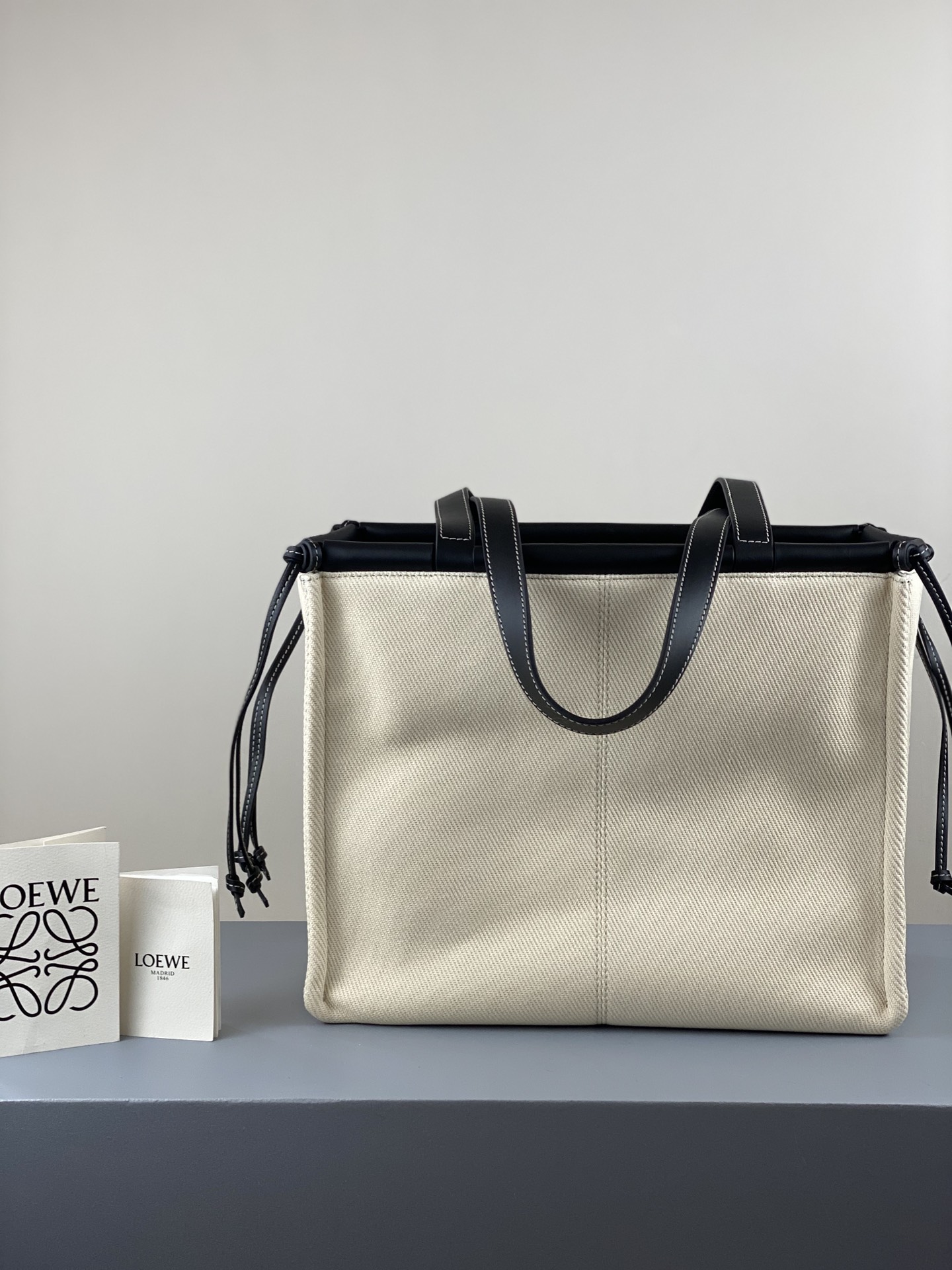 L0ew* small cushion tote bag canvas and calfskin light oat and black 330.02aa93 32 x 24 x 16cm
