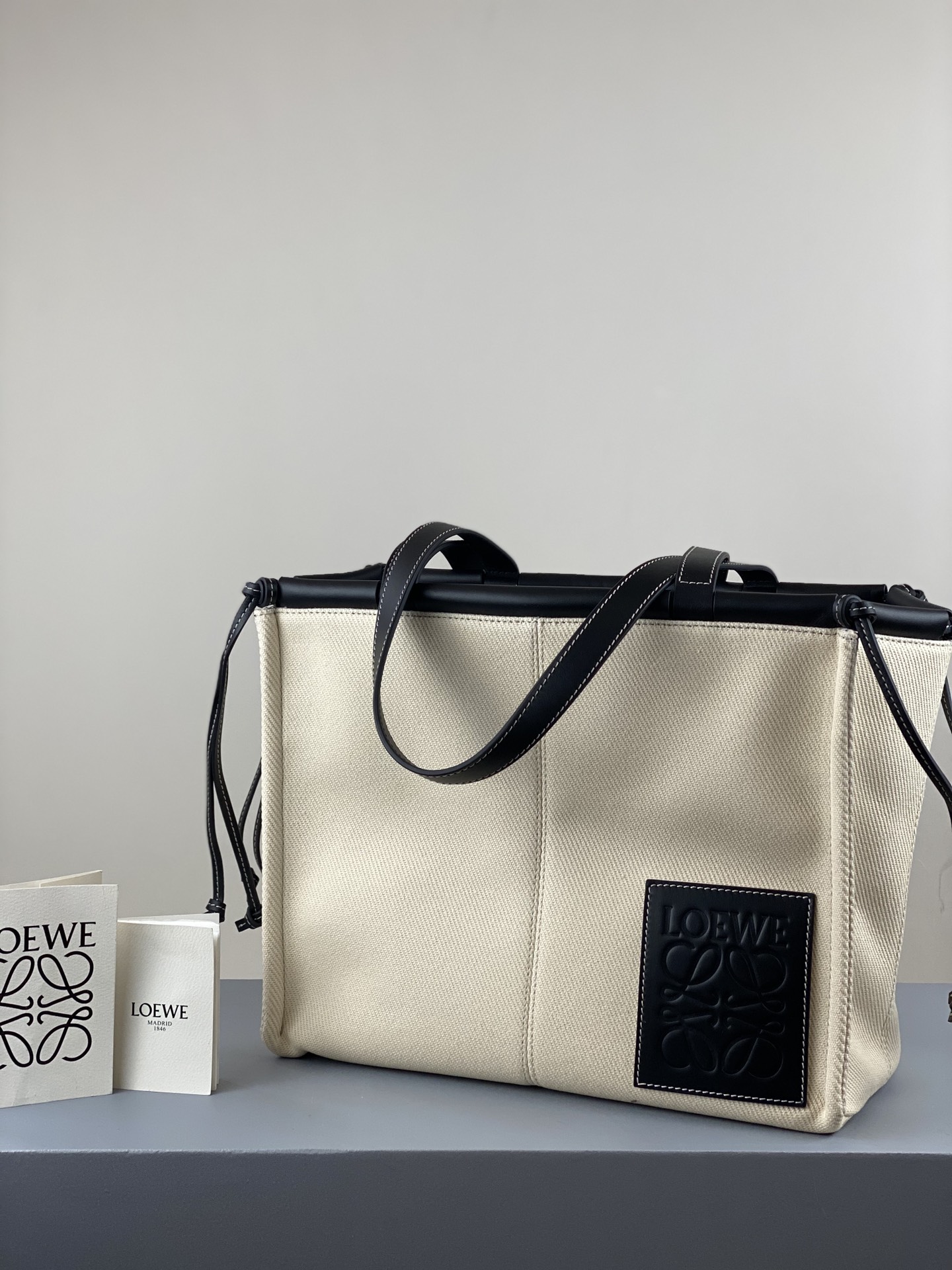 L0ew* small cushion tote bag canvas and calfskin light oat and black 330.02aa93 32 x 24 x 16cm